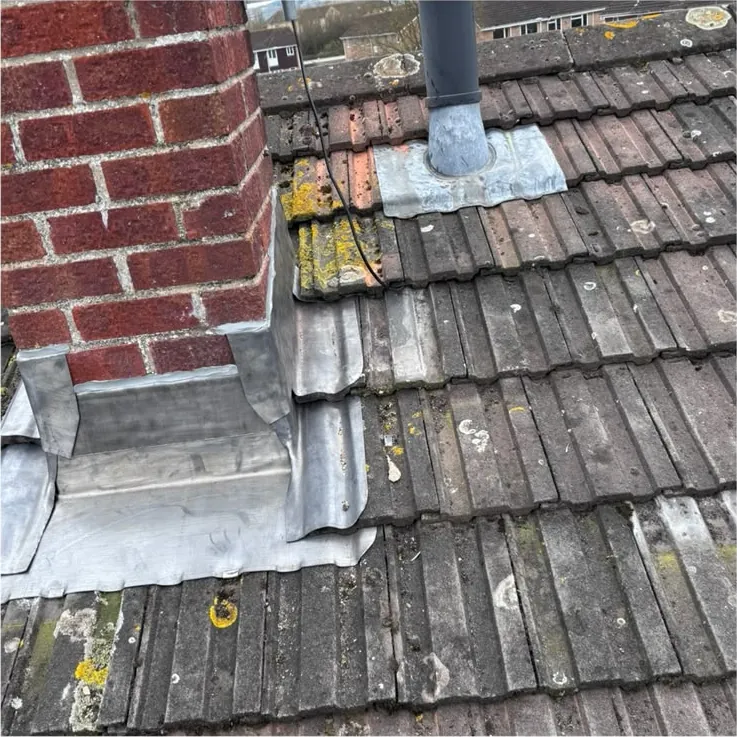 New lead soakers and flashings at a chimney